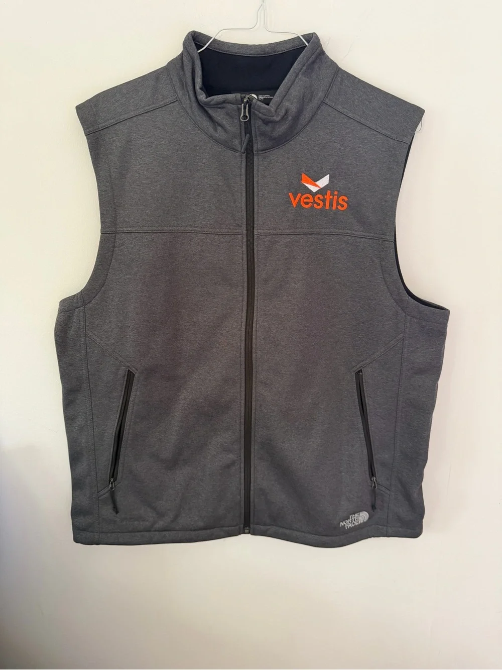 The North Face Men’s Dark Gray Sleeveless Vest with Orange Logo